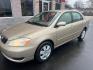 2006 GOLD TOYOTA COROLLA CE (2T1BR32E16C) with an 1.8L engine, Automatic transmission, located at 3100 Covert Avenue, Evansville, IN, 47714, (812) 473-4492, 37.955418, -87.512238 - Photo#2