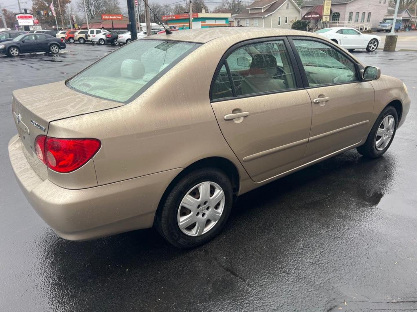 2006 GOLD TOYOTA COROLLA CE (2T1BR32E16C) with an 1.8L engine, Automatic transmission, located at 3100 Covert Avenue, Evansville, IN, 47714, (812) 473-4492, 37.955418, -87.512238 - Photo#4