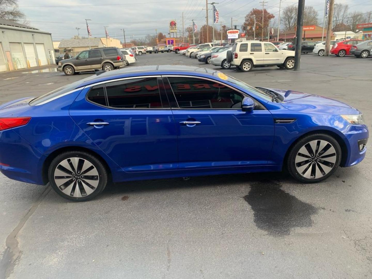 2012 BLUE KIA OPTIMA SX (5XXGR4A62CG) with an 2.0L engine, Automatic transmission, located at 3100 Covert Avenue, Evansville, IN, 47714, (812) 473-4492, 37.955418, -87.512238 - Photo#1