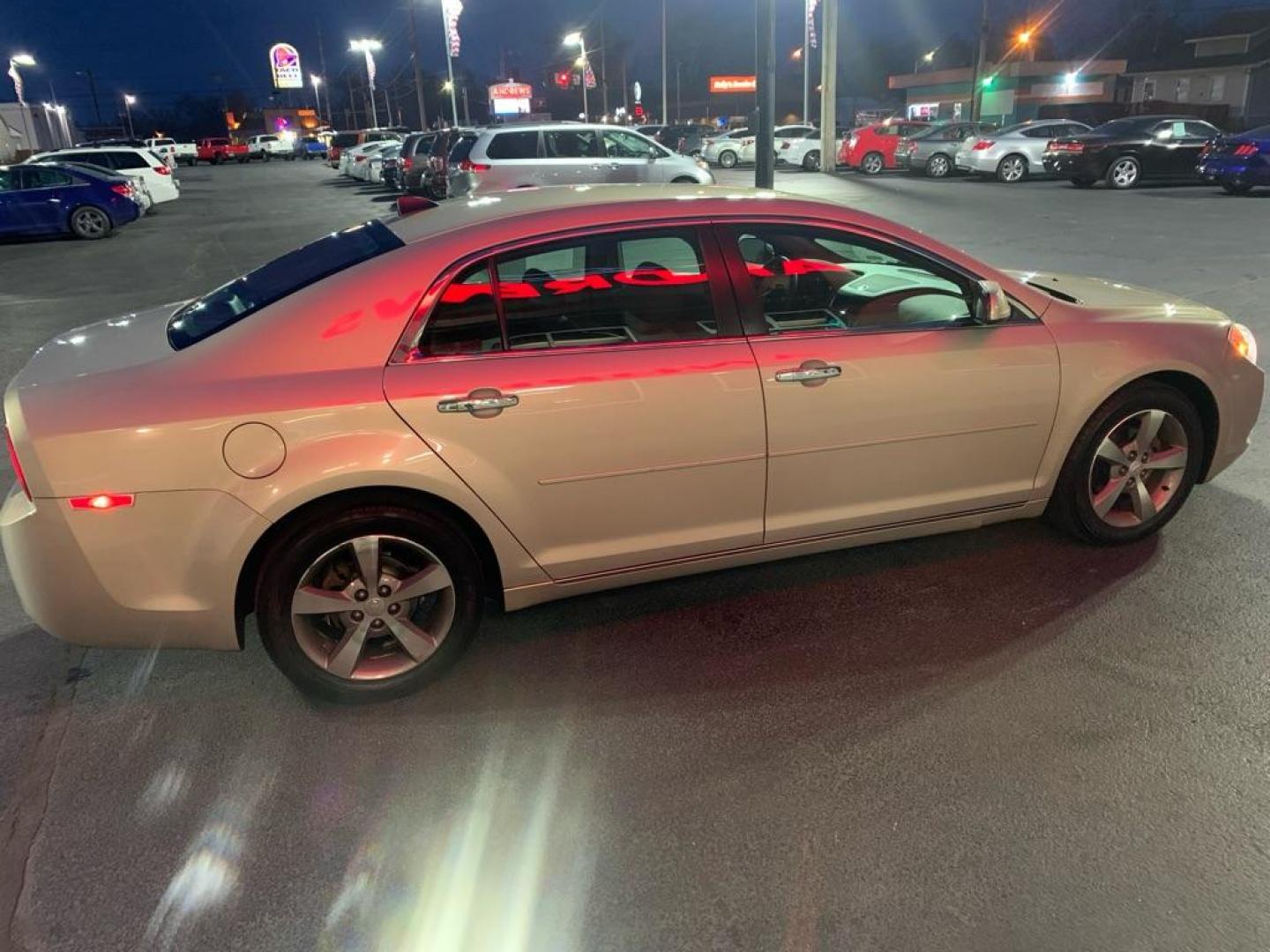 2012 TAN CHEVROLET MALIBU 1LT (1G1ZC5E09CF) with an 2.4L engine, Automatic transmission, located at 3100 Covert Avenue, Evansville, IN, 47714, (812) 473-4492, 37.955418, -87.512238 - Photo#1
