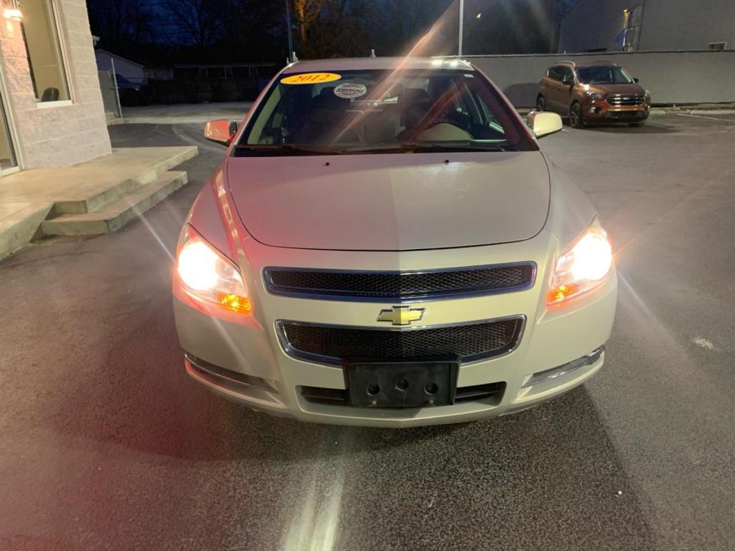 2012 TAN CHEVROLET MALIBU 1LT (1G1ZC5E09CF) with an 2.4L engine, Automatic transmission, located at 3100 Covert Avenue, Evansville, IN, 47714, (812) 473-4492, 37.955418, -87.512238 - Photo#2