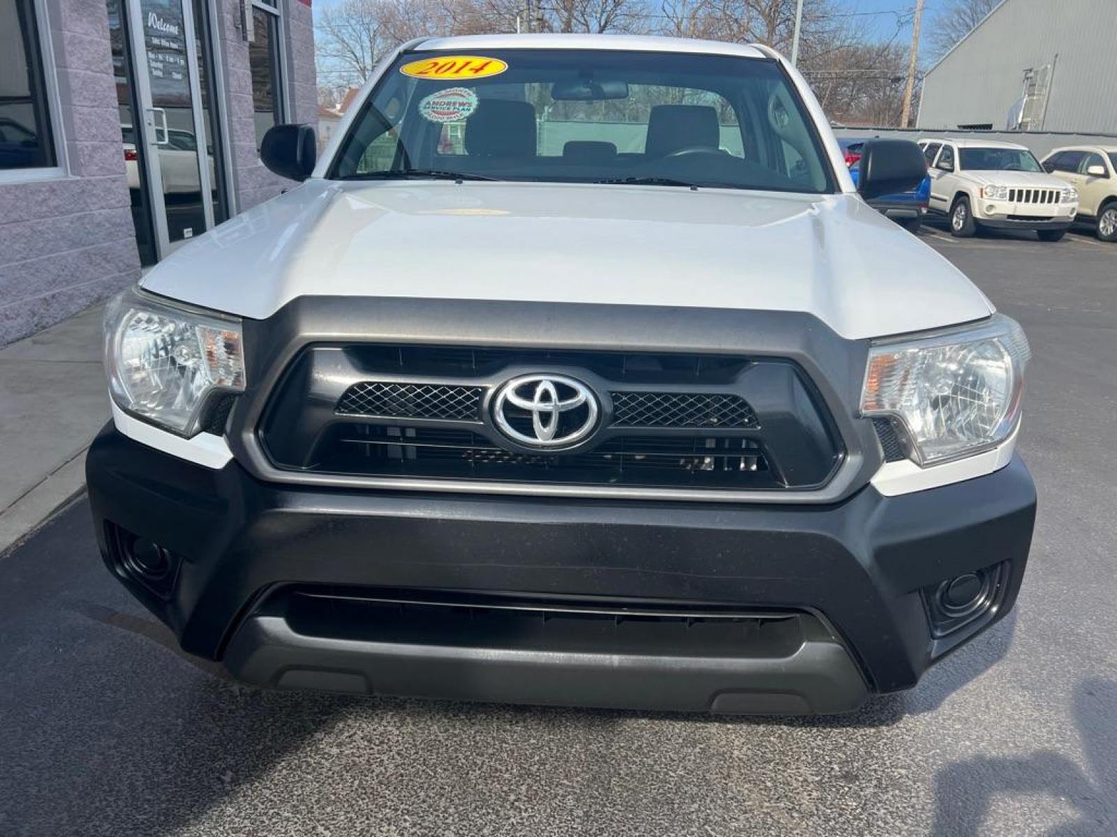 2014 WHITE TOYOTA TACOMA (5TFNX4CN6EX) with an 2.7L engine, Automatic transmission, located at 3100 Covert Avenue, Evansville, IN, 47714, (812) 473-4492, 37.955418, -87.512238 - Photo #2