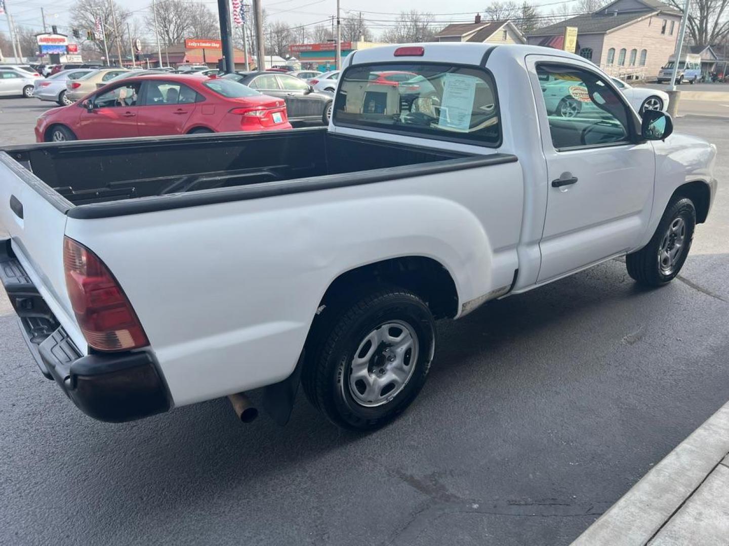 2014 WHITE TOYOTA TACOMA (5TFNX4CN6EX) with an 2.7L engine, Automatic transmission, located at 3100 Covert Avenue, Evansville, IN, 47714, (812) 473-4492, 37.955418, -87.512238 - Photo#4