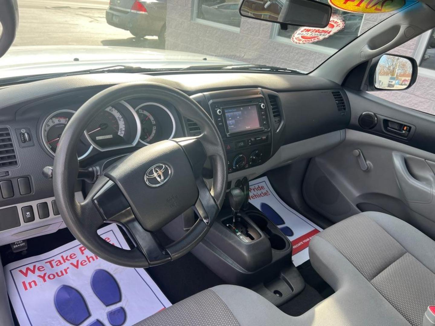 2014 WHITE TOYOTA TACOMA (5TFNX4CN6EX) with an 2.7L engine, Automatic transmission, located at 3100 Covert Avenue, Evansville, IN, 47714, (812) 473-4492, 37.955418, -87.512238 - Photo#7
