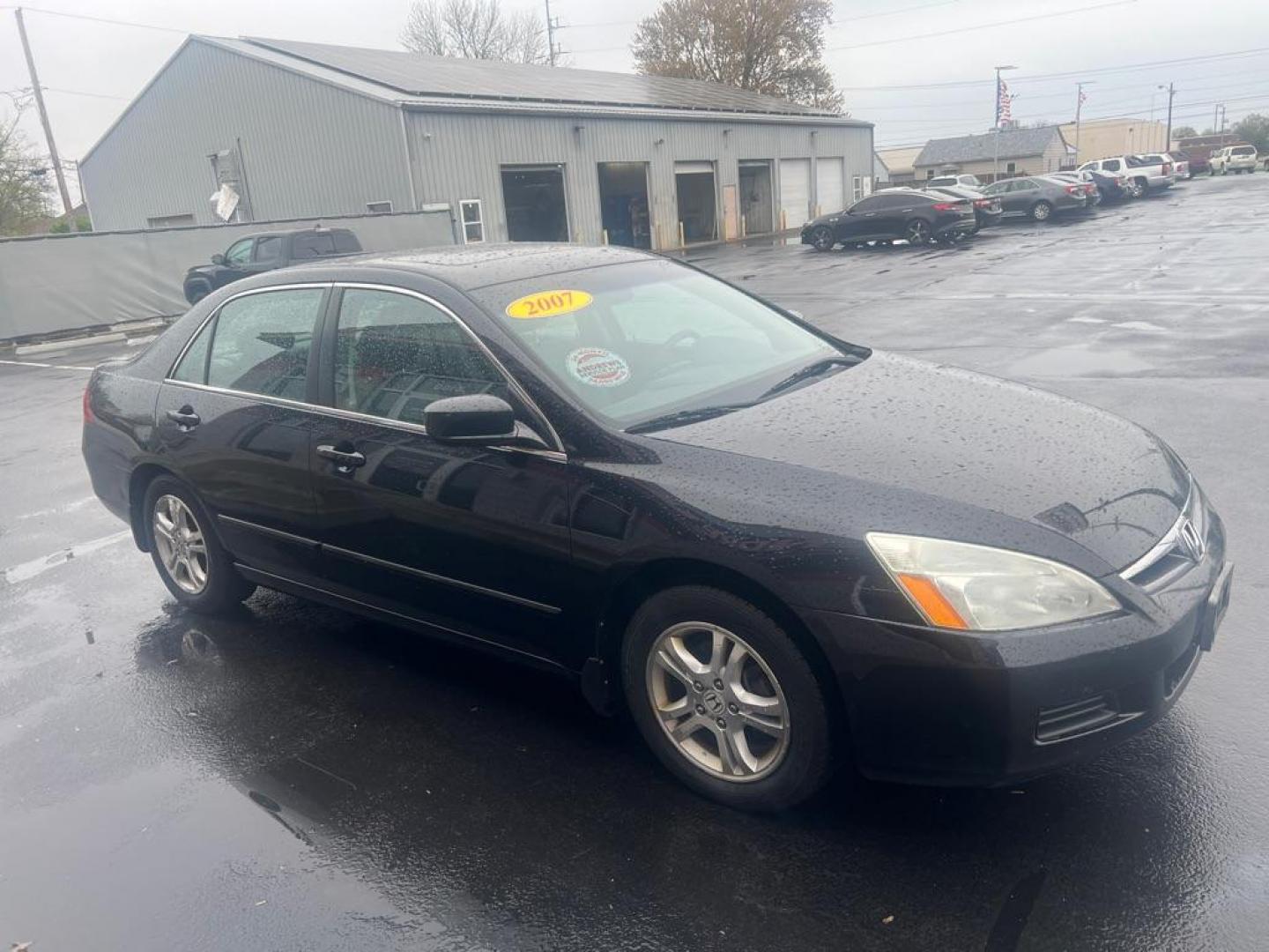 2007 BLACK HONDA ACCORD EX (1HGCM56847A) with an 2.4L engine, Automatic transmission, located at 3100 Covert Avenue, Evansville, IN, 47714, (812) 473-4492, 37.955418, -87.512238 - Photo#2
