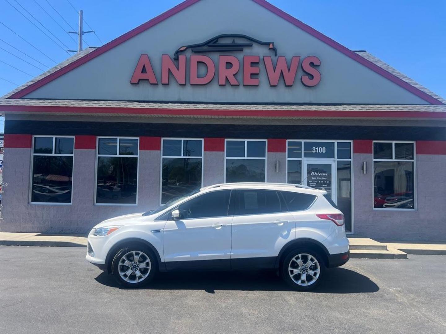 2014 WHITE FORD ESCAPE TITANIUM (1FMCU0JX3EU) with an 1.6L engine, Automatic transmission, located at 3100 Covert Avenue, Evansville, IN, 47714, (812) 473-4492, 37.955418, -87.512238 - Photo#0