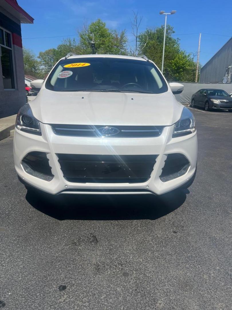 2014 WHITE FORD ESCAPE TITANIUM (1FMCU0JX3EU) with an 1.6L engine, Automatic transmission, located at 3100 Covert Avenue, Evansville, IN, 47714, (812) 473-4492, 37.955418, -87.512238 - Photo#1