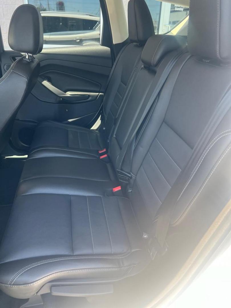 2014 WHITE FORD ESCAPE TITANIUM (1FMCU0JX3EU) with an 1.6L engine, Automatic transmission, located at 3100 Covert Avenue, Evansville, IN, 47714, (812) 473-4492, 37.955418, -87.512238 - Photo#6