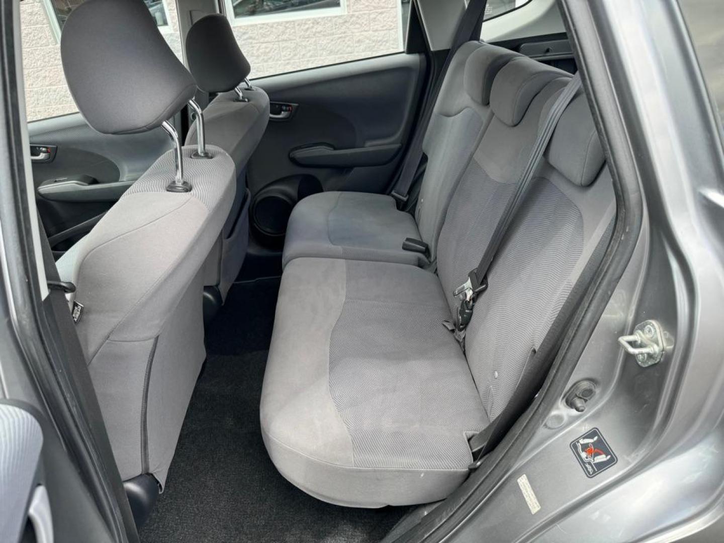 2010 SILVER HONDA FIT (JHMGE8H26AS) with an 1.5L engine, Automatic transmission, located at 3100 Covert Avenue, Evansville, IN, 47714, (812) 473-4492, 37.955418, -87.512238 - Photo#5