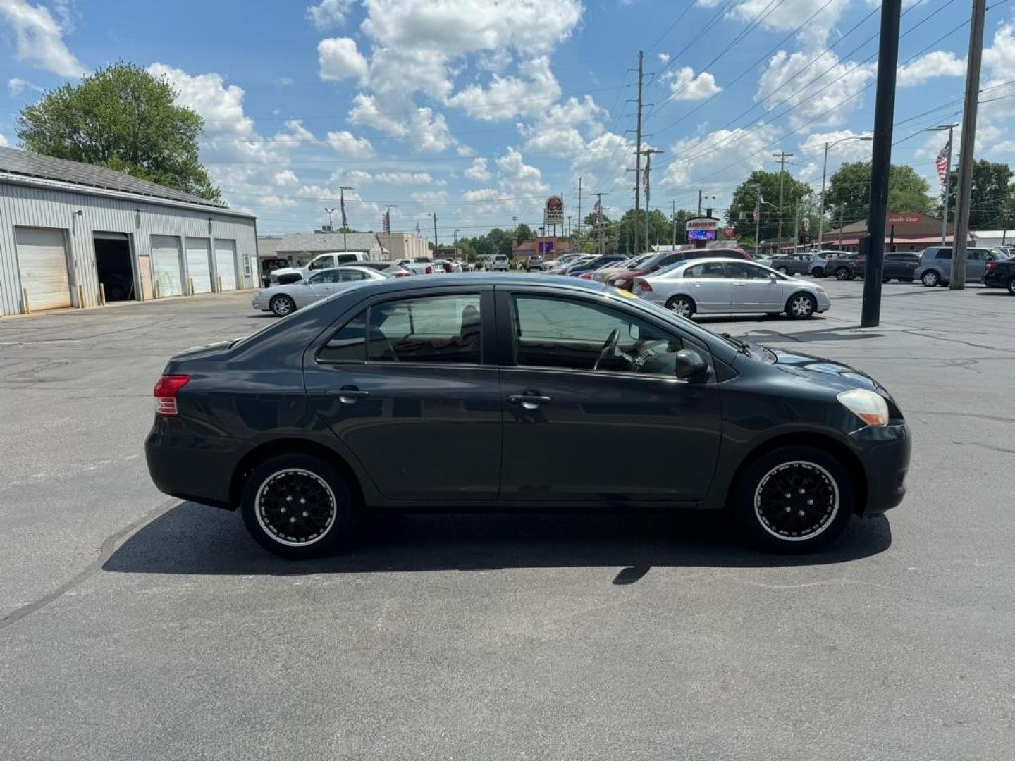 2010 GRAY TOYOTA YARIS (JTDBT4K3XA4) with an 1.5L engine, Automatic transmission, located at 3100 Covert Avenue, Evansville, IN, 47714, (812) 473-4492, 37.955418, -87.512238 - Photo#2