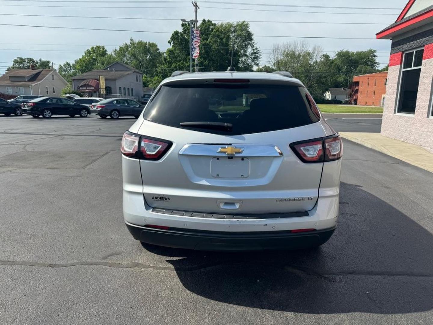 2016 SILVER CHEVROLET TRAVERSE LT (1GNKRHKD9GJ) with an 3.6L engine, Automatic transmission, located at 3100 Covert Avenue, Evansville, IN, 47714, (812) 473-4492, 37.955418, -87.512238 - Photo#3