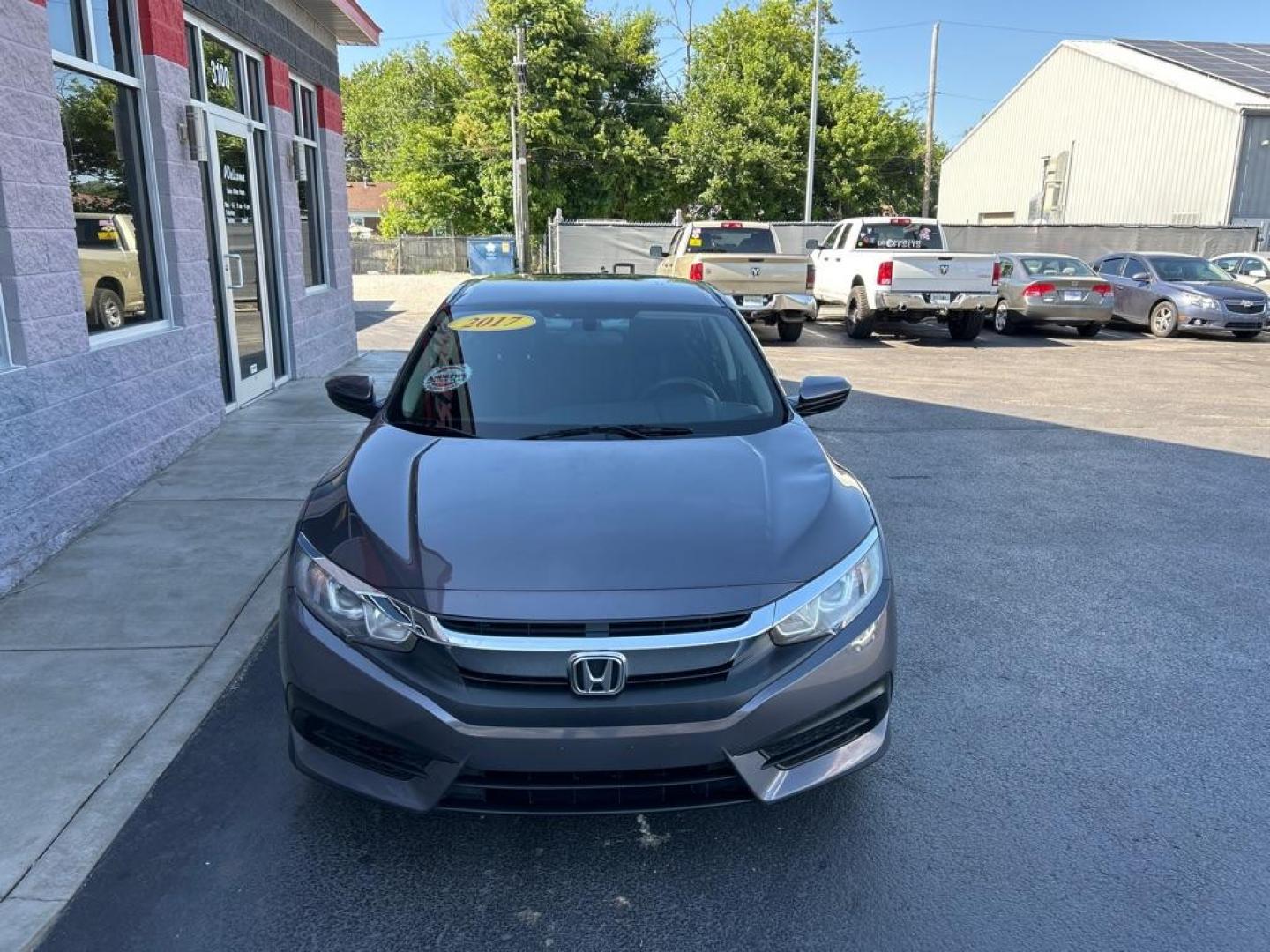 2017 GRAY HONDA CIVIC LX (2HGFC2F54HH) with an 2.0L engine, Continuously Variable transmission, located at 3100 Covert Avenue, Evansville, IN, 47714, (812) 473-4492, 37.955418, -87.512238 - Photo#1