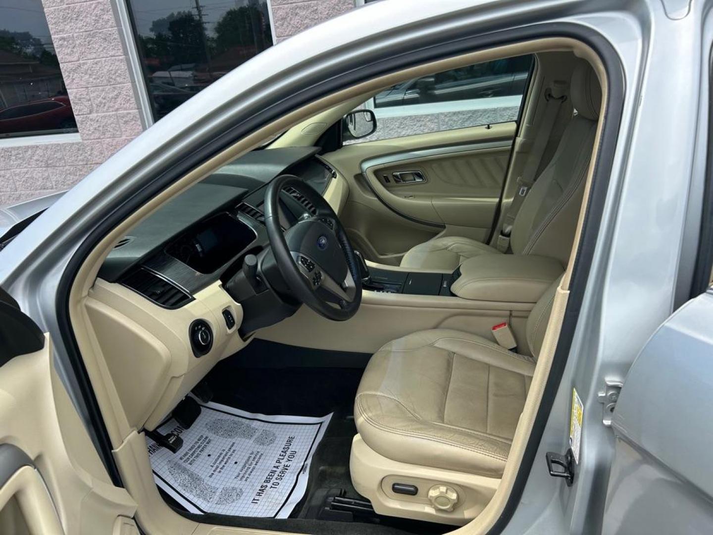 2013 SILVER FORD TAURUS SEL (1FAHP2E81DG) with an 3.5L engine, Automatic transmission, located at 3100 Covert Avenue, Evansville, IN, 47714, (812) 473-4492, 37.955418, -87.512238 - Photo#6