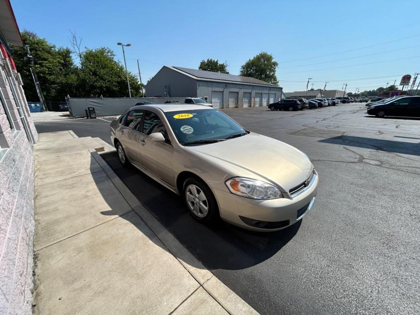 2010 GOLD CHEVROLET IMPALA LT (2G1WB5EK5A1) with an 3.5L engine, Automatic transmission, located at 3100 Covert Avenue, Evansville, IN, 47714, (812) 473-4492, 37.955418, -87.512238 - Photo#2