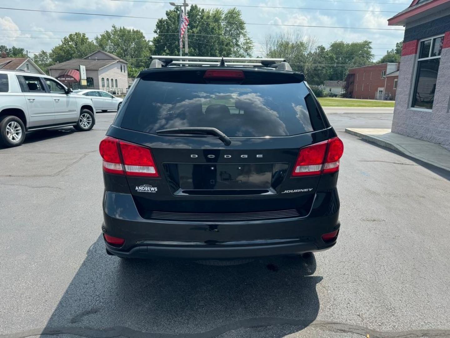 2016 BLACK DODGE JOURNEY SXT (3C4PDCBB2GT) with an 2.4L engine, Automatic transmission, located at 3100 Covert Avenue, Evansville, IN, 47714, (812) 473-4492, 37.955418, -87.512238 - Photo#3
