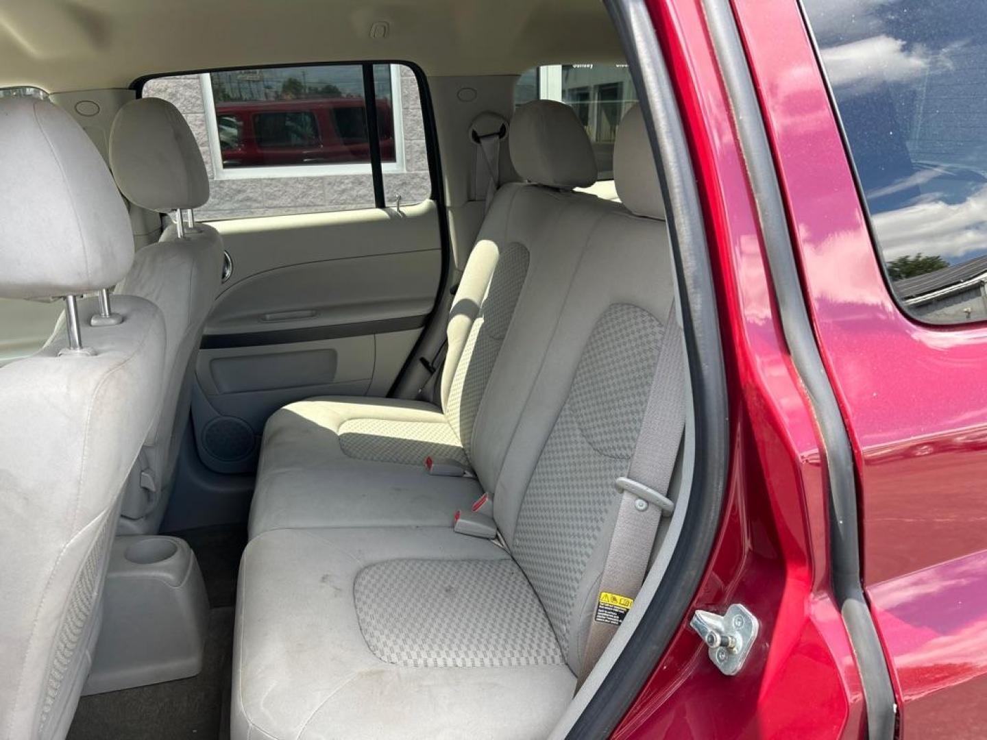 2006 RED CHEVROLET HHR LT (3GNDA23D76S) with an 2.2L engine, Automatic transmission, located at 3100 Covert Avenue, Evansville, IN, 47714, (812) 473-4492, 37.955418, -87.512238 - Photo#6