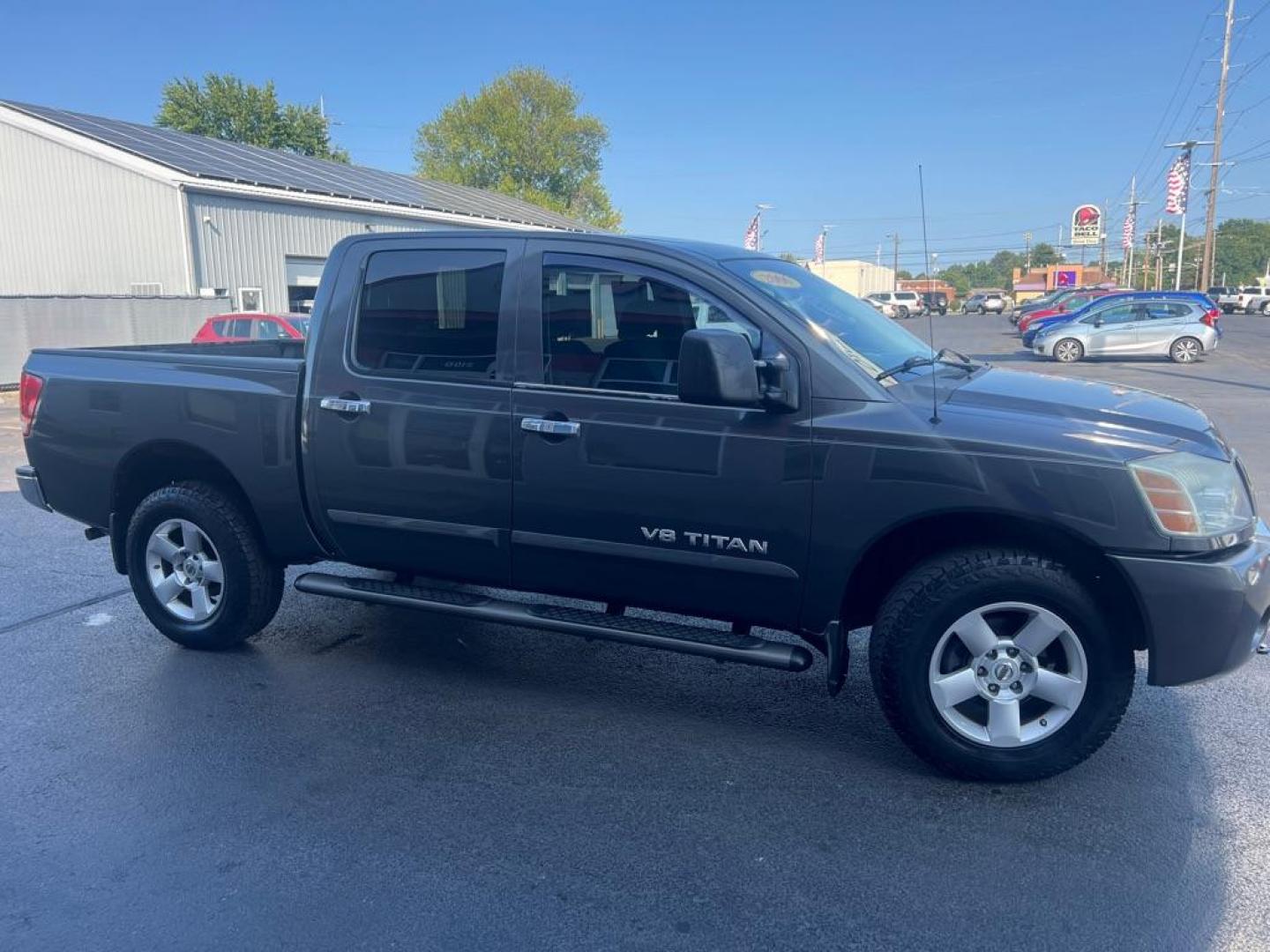 2006 GRAY NISSAN TITAN XE (1N6AA07B66N) with an 5.6L engine, Automatic transmission, located at 3100 Covert Avenue, Evansville, IN, 47714, (812) 473-4492, 37.955418, -87.512238 - Photo#2