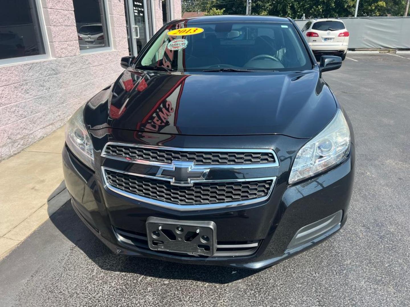 2013 BLACK CHEVROLET MALIBU 1LT (1G11D5RR6DF) with an 2.4L engine, Automatic transmission, located at 3100 Covert Avenue, Evansville, IN, 47714, (812) 473-4492, 37.955418, -87.512238 - Photo#1