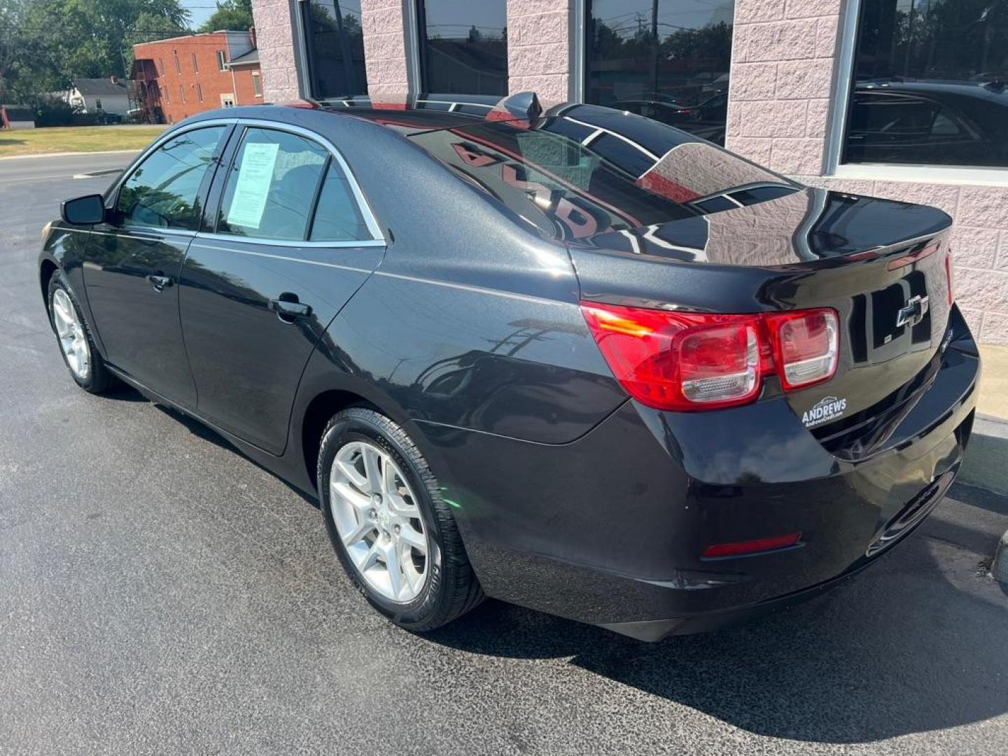 2013 BLACK CHEVROLET MALIBU 1LT (1G11D5RR6DF) with an 2.4L engine, Automatic transmission, located at 3100 Covert Avenue, Evansville, IN, 47714, (812) 473-4492, 37.955418, -87.512238 - Photo#3