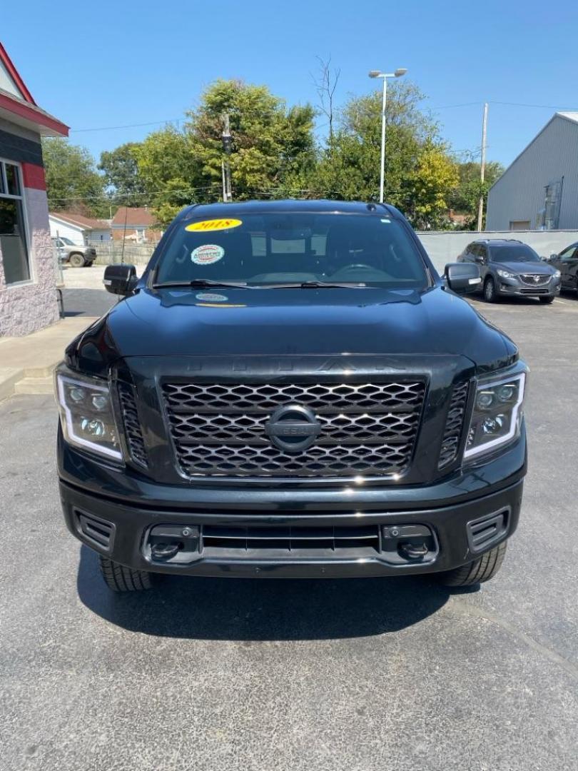 2018 BLACK NISSAN TITAN SV (1N6AA1E5XJN) with an 5.6L engine, Automatic transmission, located at 3100 Covert Avenue, Evansville, IN, 47714, (812) 473-4492, 37.955418, -87.512238 - **2 previous accidents reported** - Photo#1