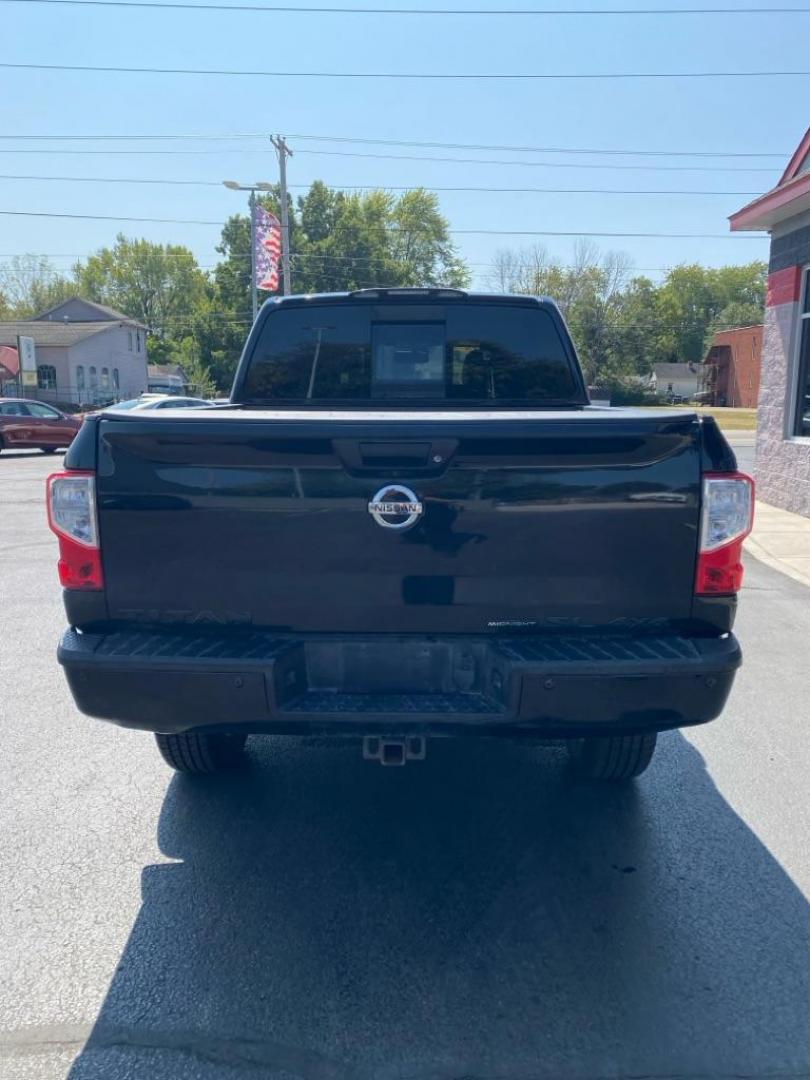 2018 BLACK NISSAN TITAN SV (1N6AA1E5XJN) with an 5.6L engine, Automatic transmission, located at 3100 Covert Avenue, Evansville, IN, 47714, (812) 473-4492, 37.955418, -87.512238 - **2 previous accidents reported** - Photo#3