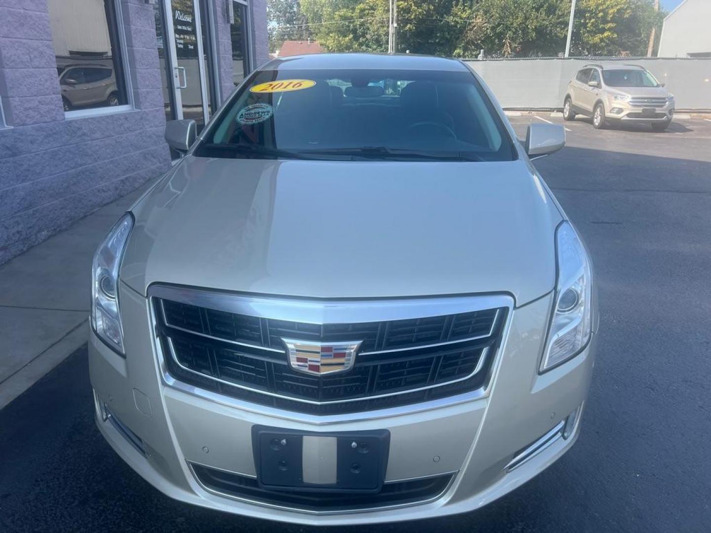2016 GOLD CADILLAC XTS LUXURY COLLECTION (2G61M5S36G9) with an 3.6L engine, Automatic transmission, located at 3100 Covert Avenue, Evansville, IN, 47714, (812) 473-4492, 37.955418, -87.512238 - Photo#2