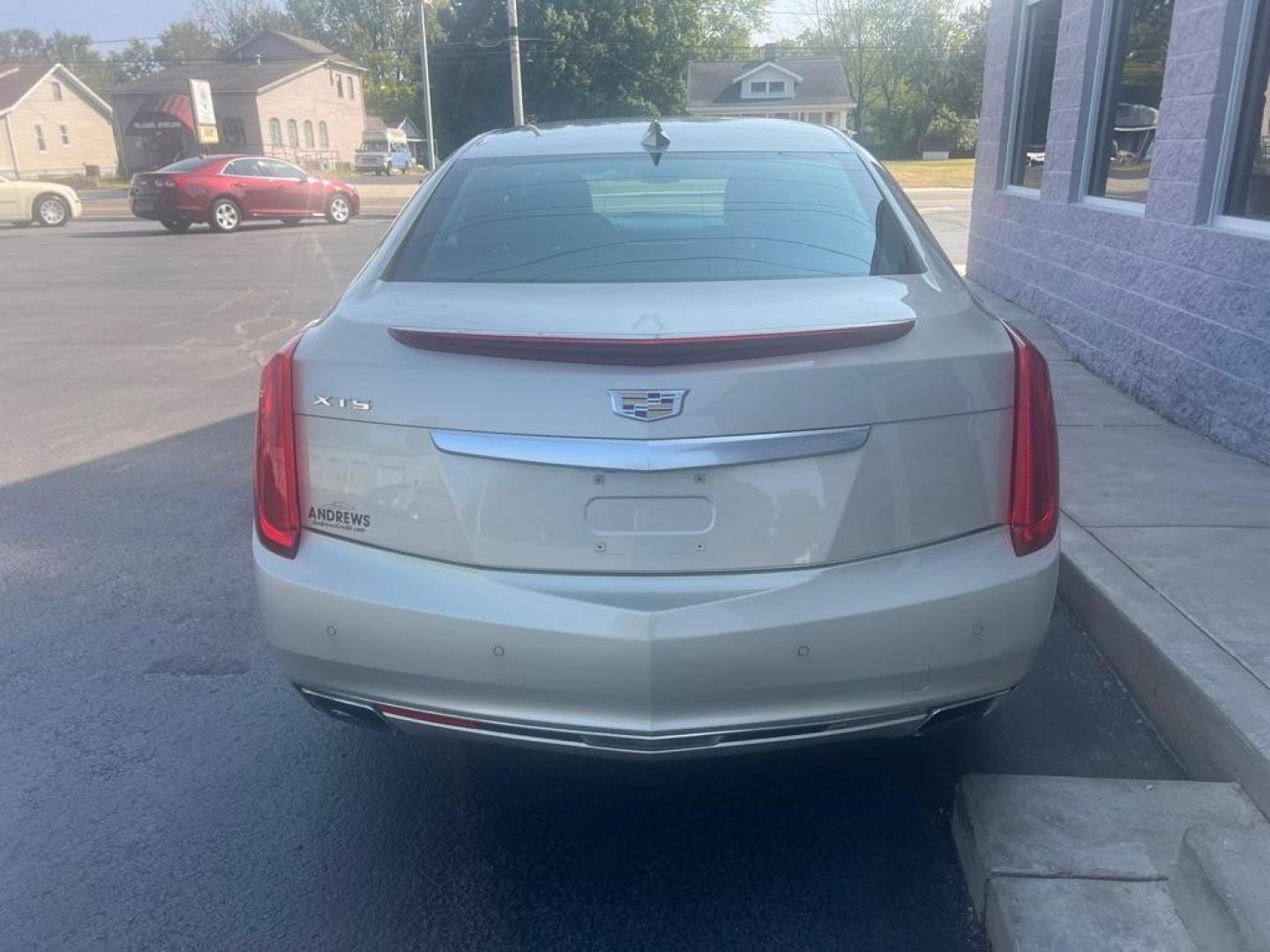 2016 GOLD CADILLAC XTS LUXURY COLLECTION (2G61M5S36G9) with an 3.6L engine, Automatic transmission, located at 3100 Covert Avenue, Evansville, IN, 47714, (812) 473-4492, 37.955418, -87.512238 - Photo#4
