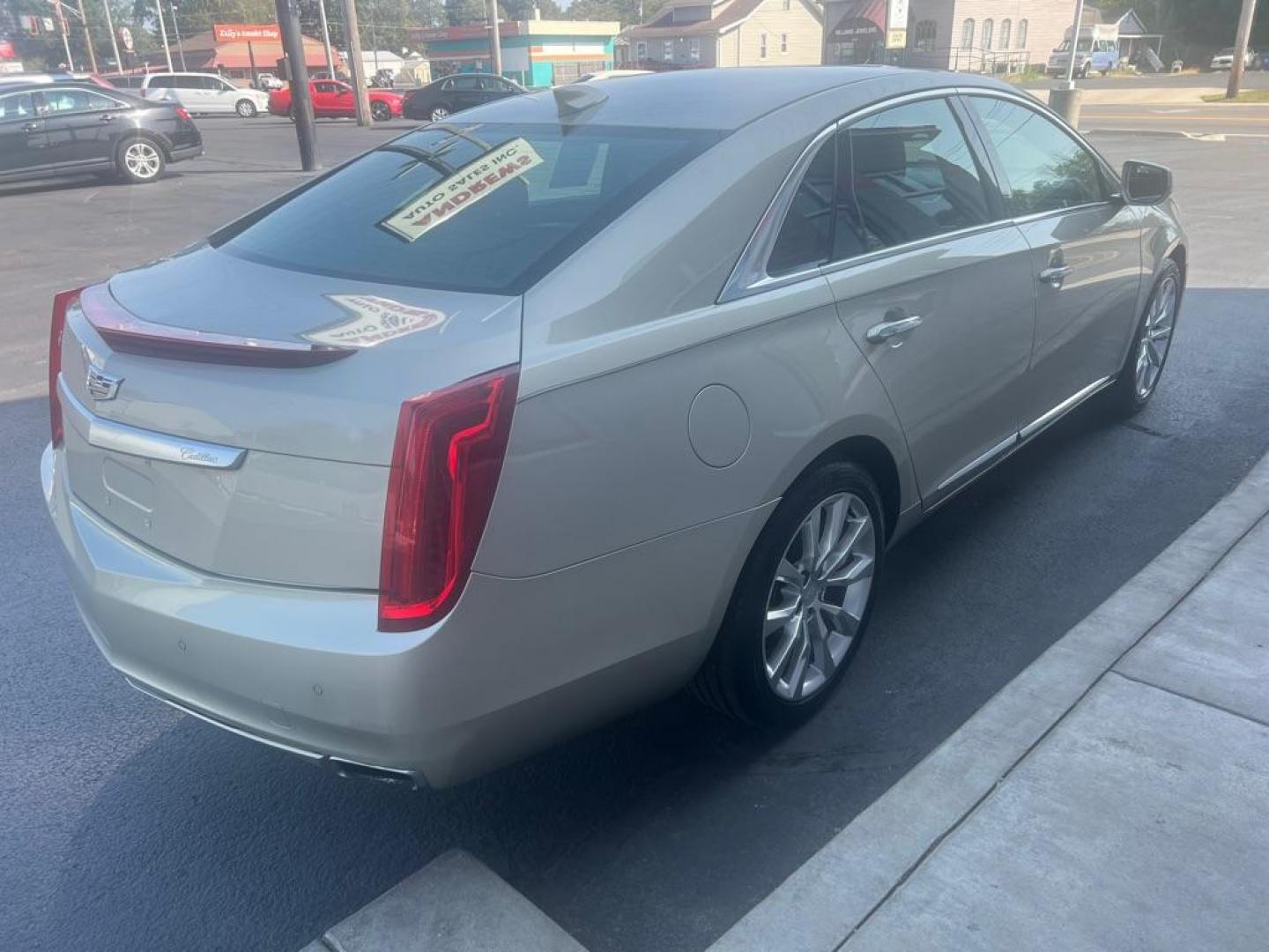 2016 GOLD CADILLAC XTS LUXURY COLLECTION (2G61M5S36G9) with an 3.6L engine, Automatic transmission, located at 3100 Covert Avenue, Evansville, IN, 47714, (812) 473-4492, 37.955418, -87.512238 - Photo#5