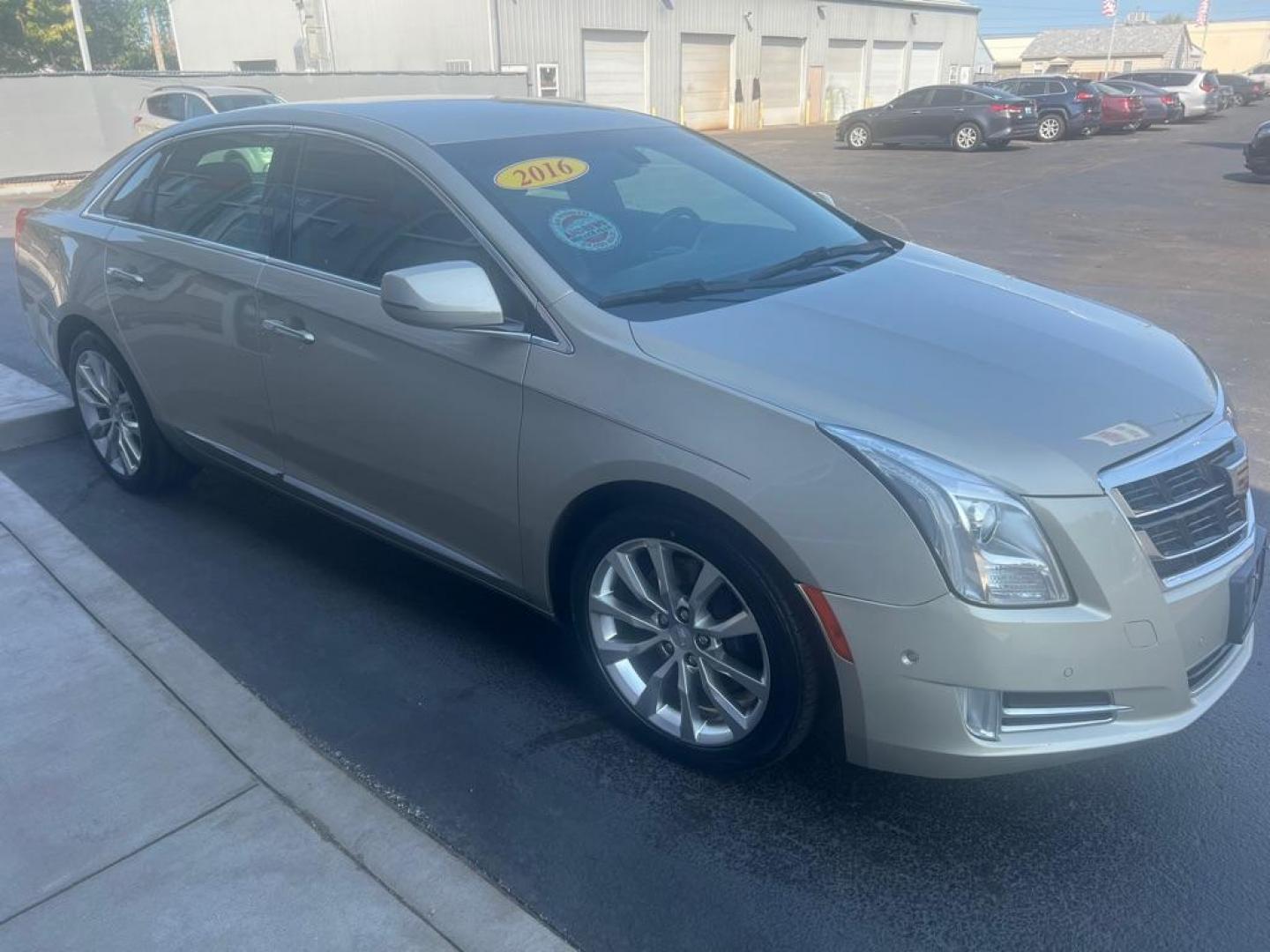 2016 GOLD CADILLAC XTS LUXURY COLLECTION (2G61M5S36G9) with an 3.6L engine, Automatic transmission, located at 3100 Covert Avenue, Evansville, IN, 47714, (812) 473-4492, 37.955418, -87.512238 - Photo#6