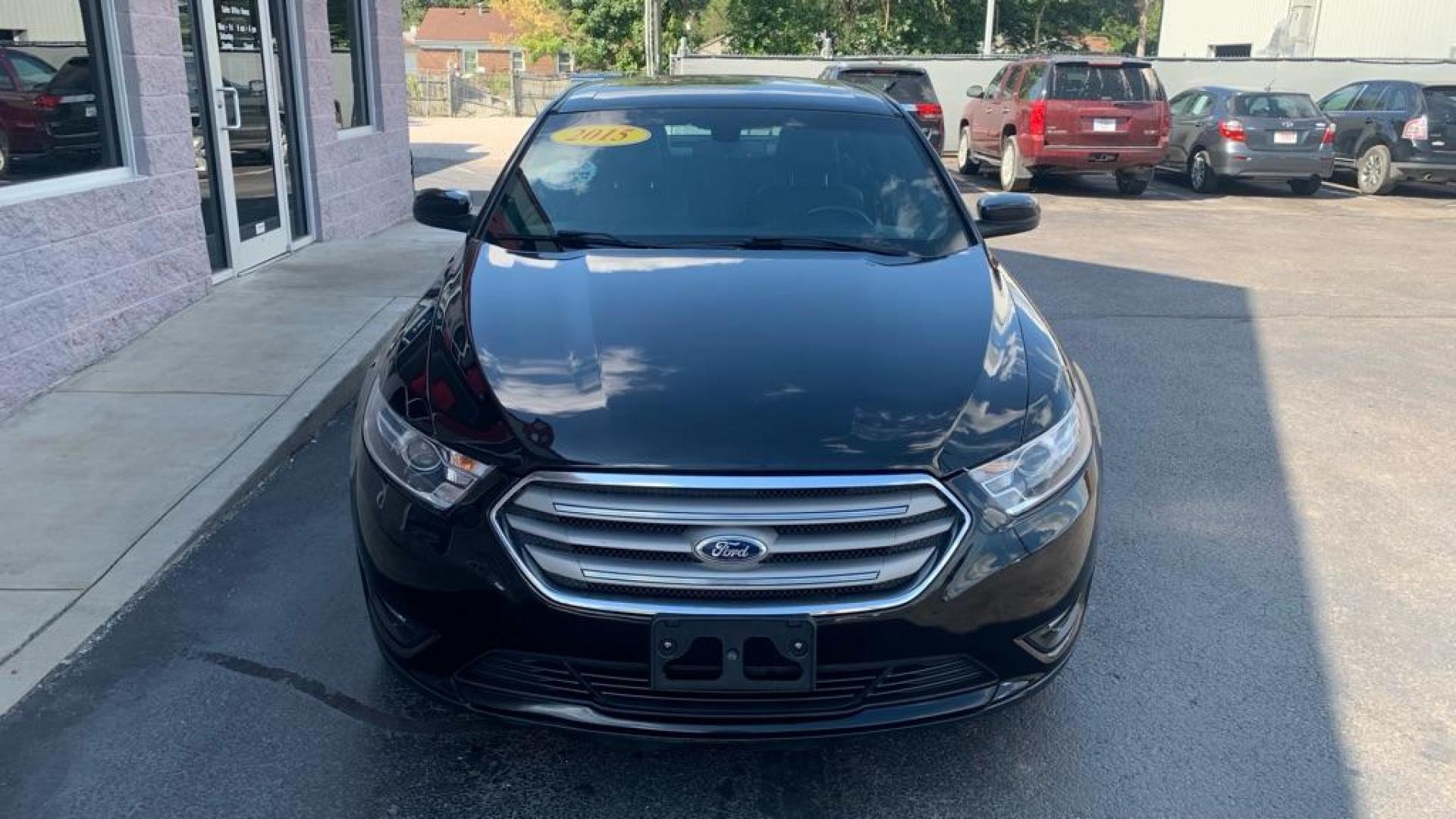 2015 BLACK FORD TAURUS SEL (1FAHP2H81FG) with an 3.5L engine, Automatic transmission, located at 3100 Covert Avenue, Evansville, IN, 47714, (812) 473-4492, 37.955418, -87.512238 - Photo#7