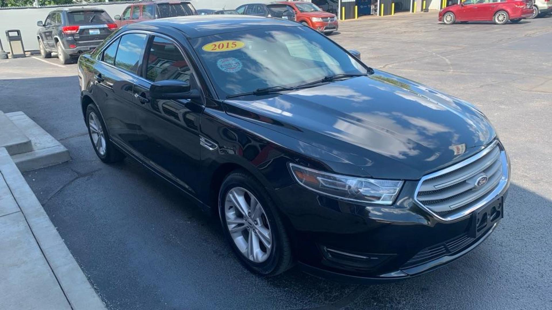2015 BLACK FORD TAURUS SEL (1FAHP2H81FG) with an 3.5L engine, Automatic transmission, located at 3100 Covert Avenue, Evansville, IN, 47714, (812) 473-4492, 37.955418, -87.512238 - Photo#8