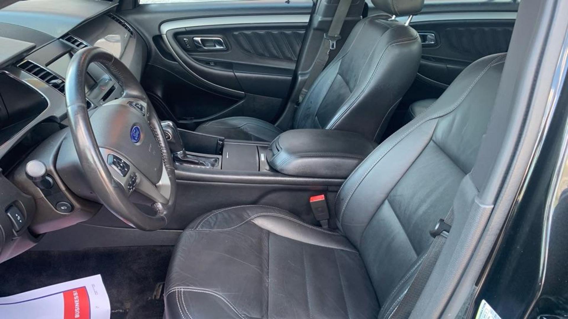 2015 BLACK FORD TAURUS SEL (1FAHP2H81FG) with an 3.5L engine, Automatic transmission, located at 3100 Covert Avenue, Evansville, IN, 47714, (812) 473-4492, 37.955418, -87.512238 - Photo#11