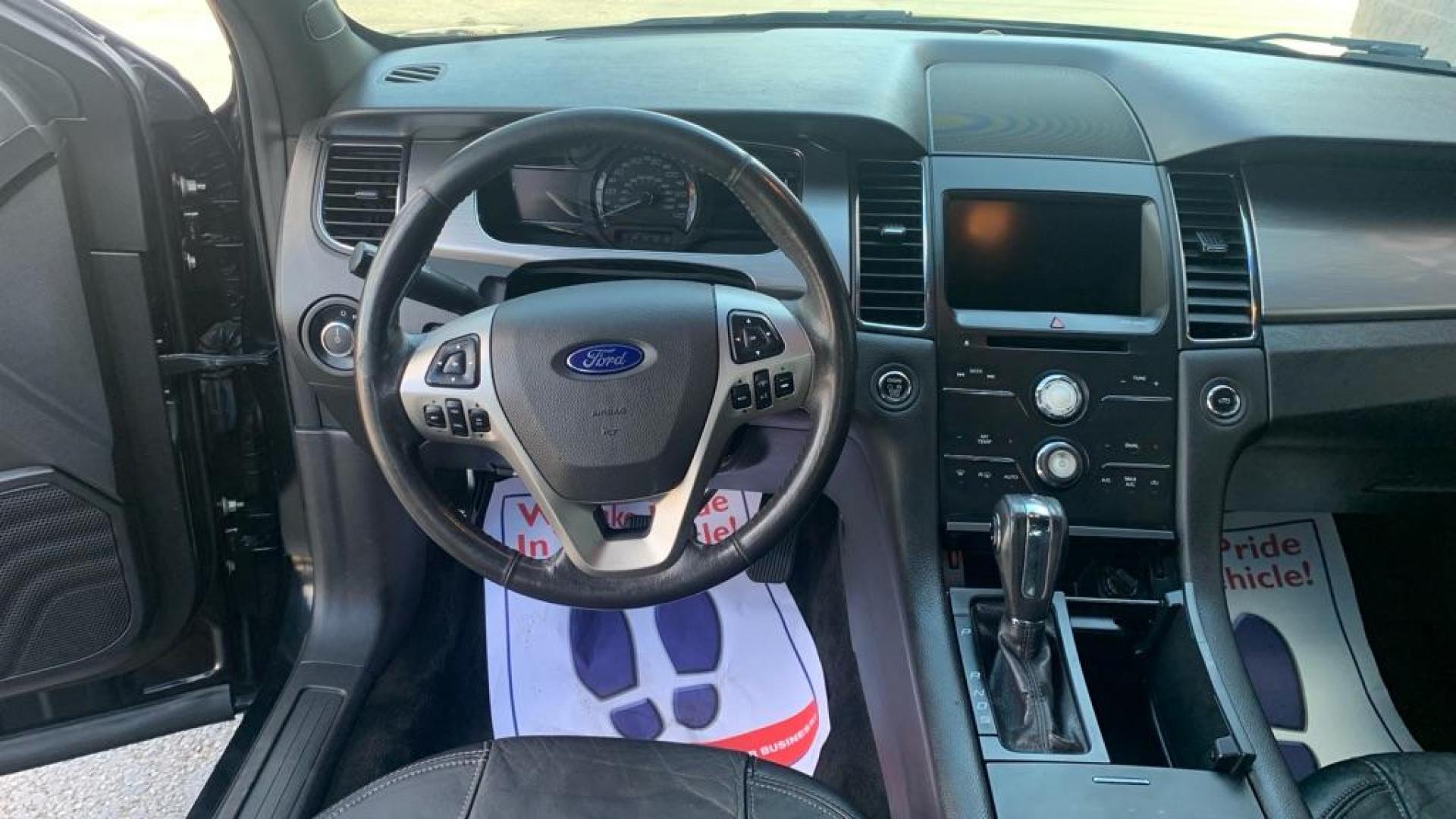 2015 BLACK FORD TAURUS SEL (1FAHP2H81FG) with an 3.5L engine, Automatic transmission, located at 3100 Covert Avenue, Evansville, IN, 47714, (812) 473-4492, 37.955418, -87.512238 - Photo#12