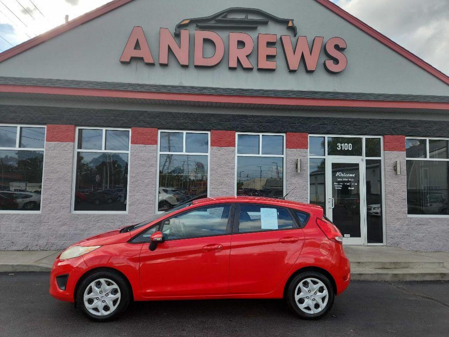 2013 RED FORD FIESTA SE (3FADP4EJ0DM) with an 1.6L engine, Automatic transmission, located at 3100 Covert Avenue, Evansville, IN, 47714, (812) 473-4492, 37.955418, -87.512238 - Photo#0