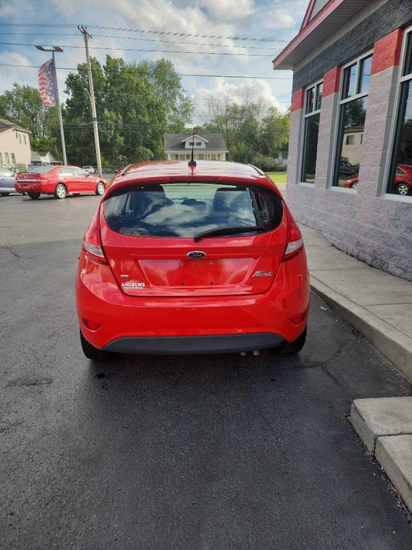 2013 RED FORD FIESTA SE (3FADP4EJ0DM) with an 1.6L engine, Automatic transmission, located at 3100 Covert Avenue, Evansville, IN, 47714, (812) 473-4492, 37.955418, -87.512238 - Photo#3