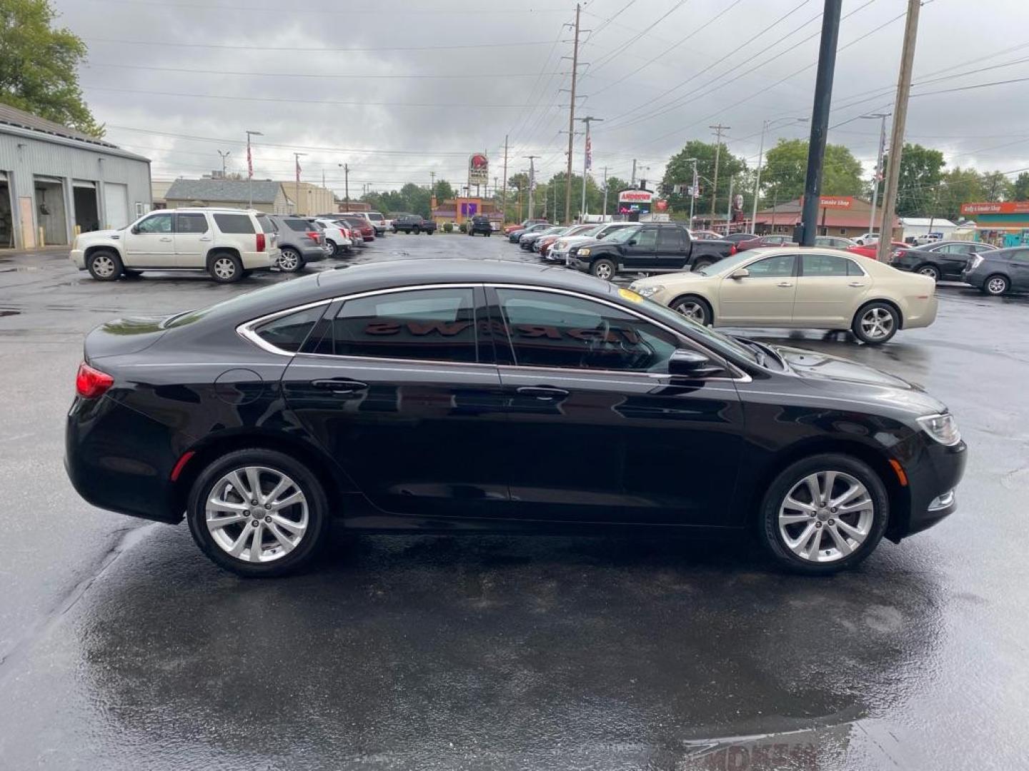 2015 BLACK CHRYSLER 200 LIMITED (1C3CCCAB1FN) with an 2.4L engine, Automatic transmission, located at 3100 Covert Avenue, Evansville, IN, 47714, (812) 473-4492, 37.955418, -87.512238 - Photo#2