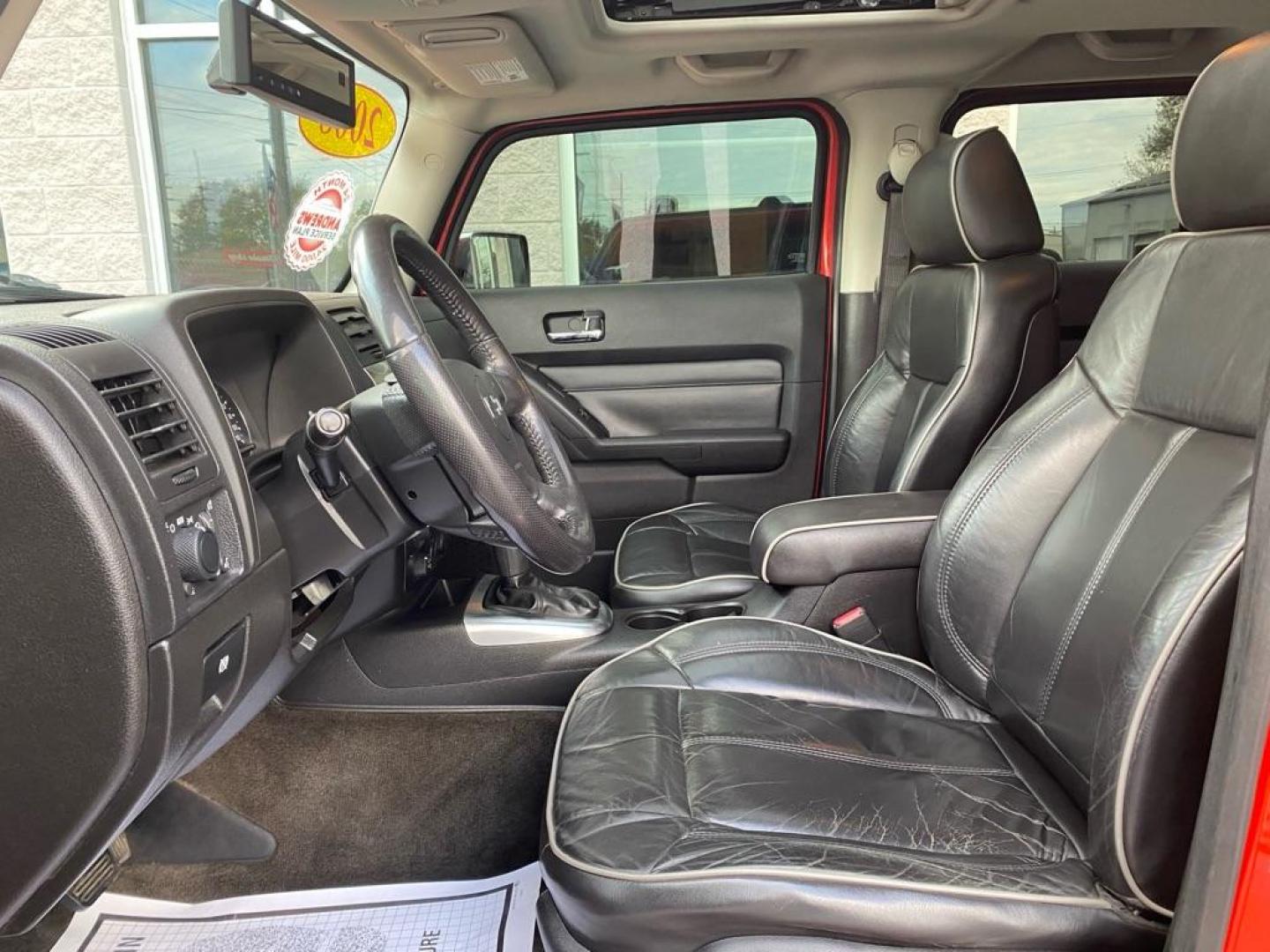 2008 ORANGE HUMMER H3 (5GTEN13E988) with an 3.7L engine, Automatic transmission, located at 3100 Covert Avenue, Evansville, IN, 47714, (812) 473-4492, 37.955418, -87.512238 - Photo#4