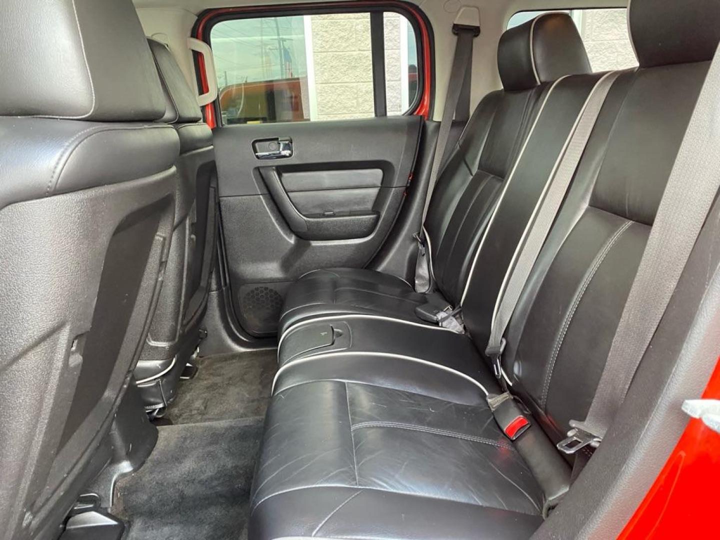 2008 ORANGE HUMMER H3 (5GTEN13E988) with an 3.7L engine, Automatic transmission, located at 3100 Covert Avenue, Evansville, IN, 47714, (812) 473-4492, 37.955418, -87.512238 - Photo#5