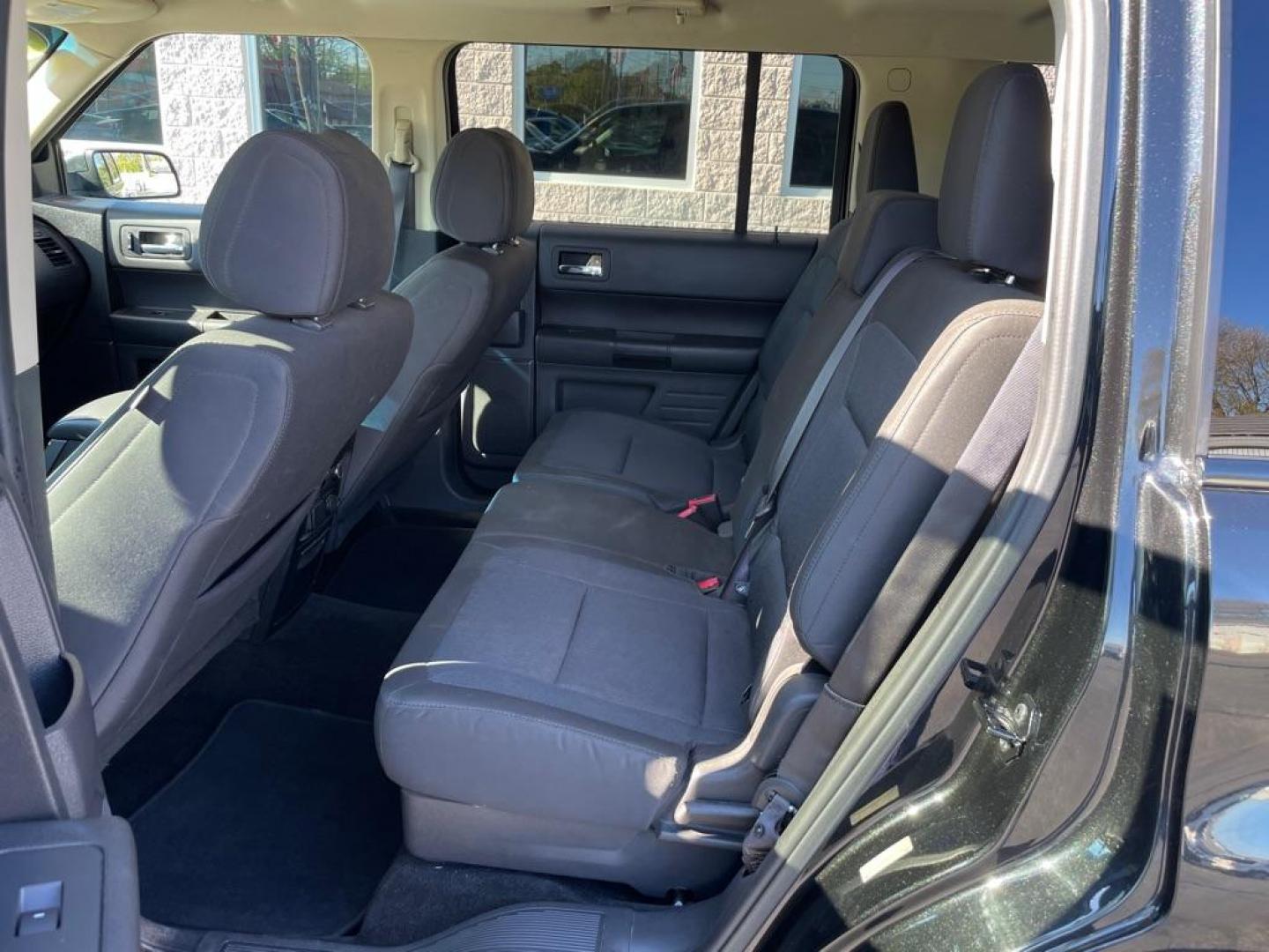 2013 BLACK FORD FLEX SE (2FMGK5B80DB) with an 3.5L engine, Automatic transmission, located at 3100 Covert Avenue, Evansville, IN, 47714, (812) 473-4492, 37.955418, -87.512238 - Photo#5