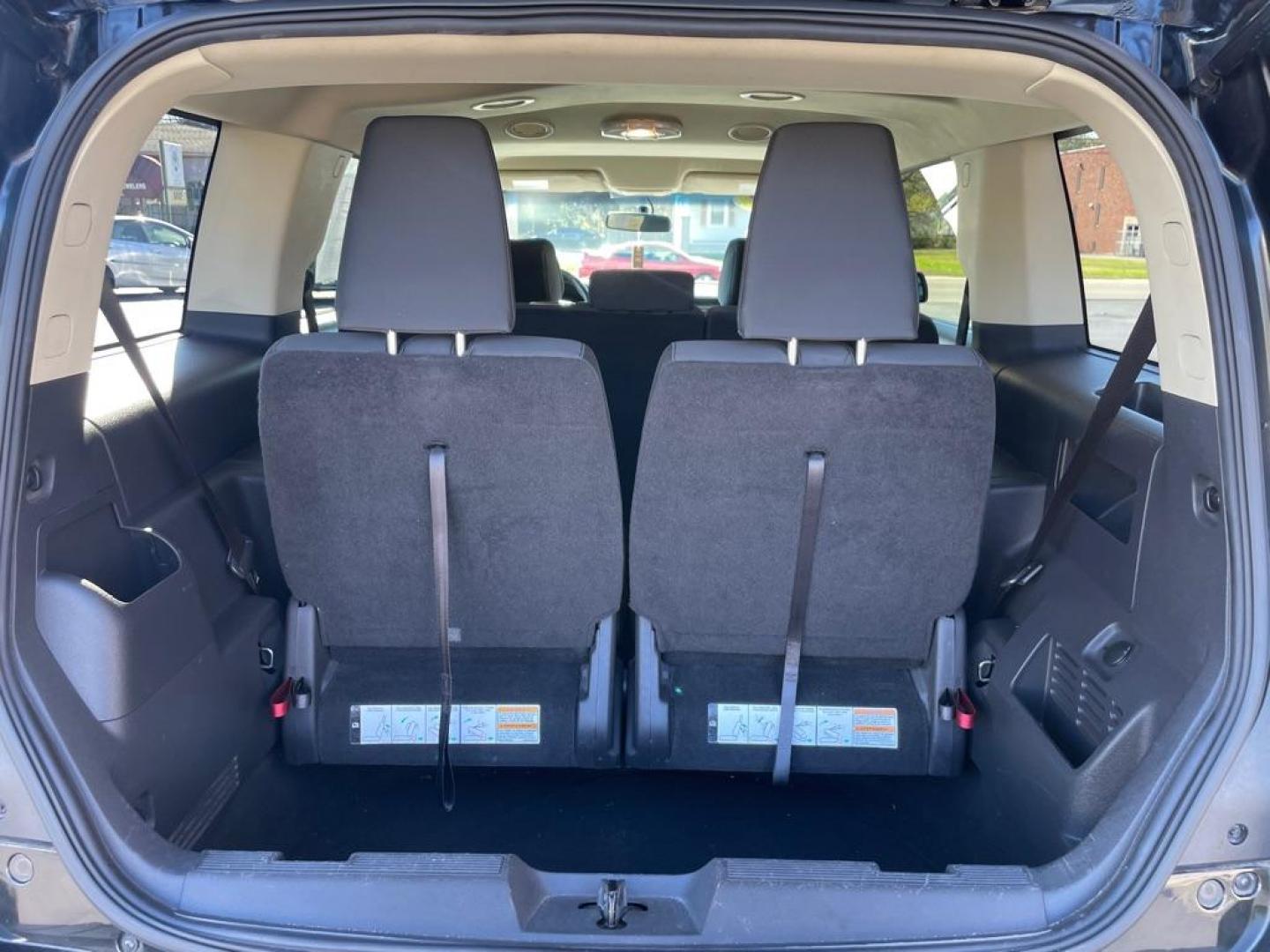 2013 BLACK FORD FLEX SE (2FMGK5B80DB) with an 3.5L engine, Automatic transmission, located at 3100 Covert Avenue, Evansville, IN, 47714, (812) 473-4492, 37.955418, -87.512238 - Photo#8