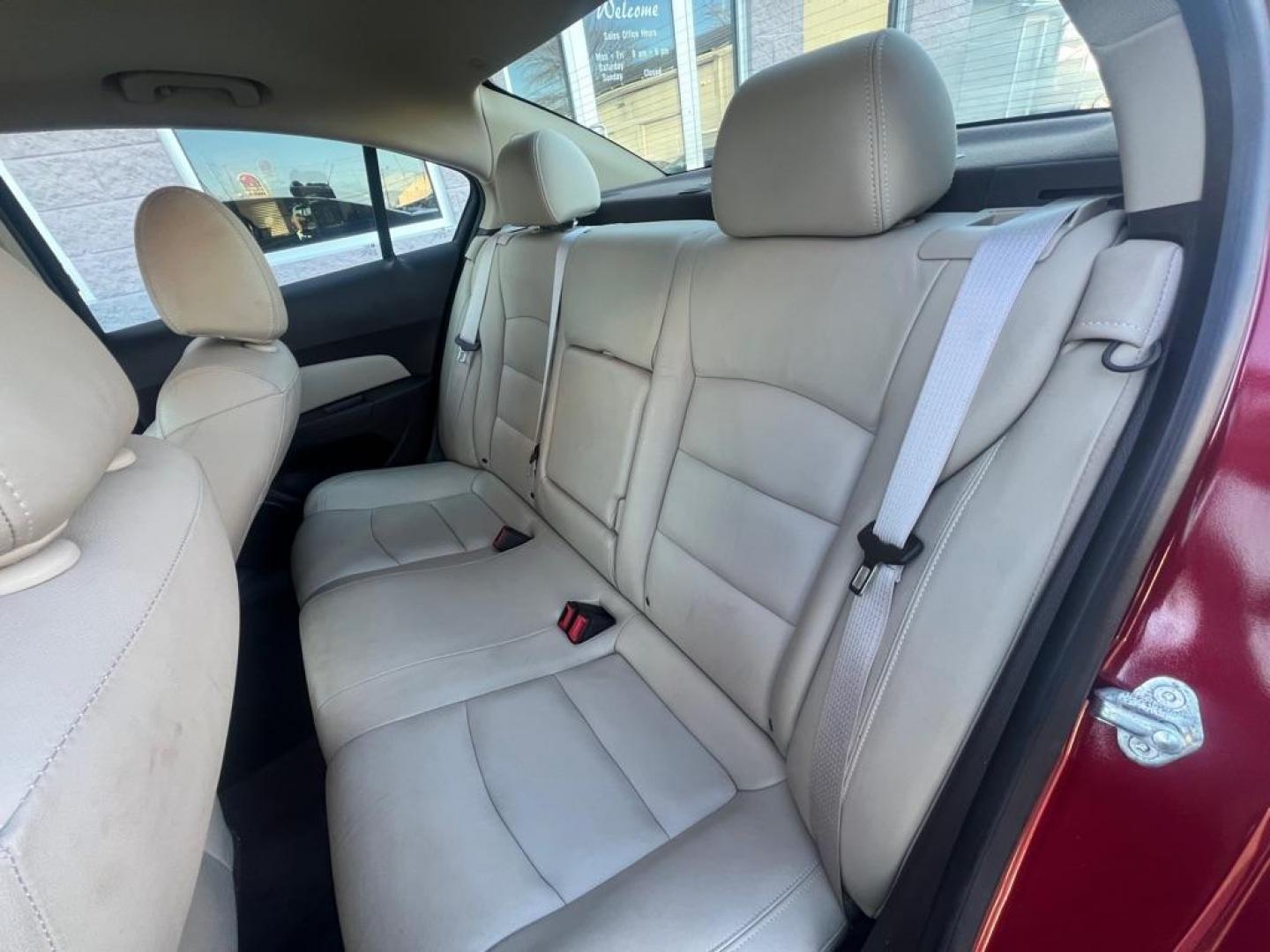 2013 RED CHEVROLET CRUZE LTZ (1G1PG5SB6D7) with an 1.4L engine, Automatic transmission, located at 3100 Covert Avenue, Evansville, IN, 47714, (812) 473-4492, 37.955418, -87.512238 - Photo#6