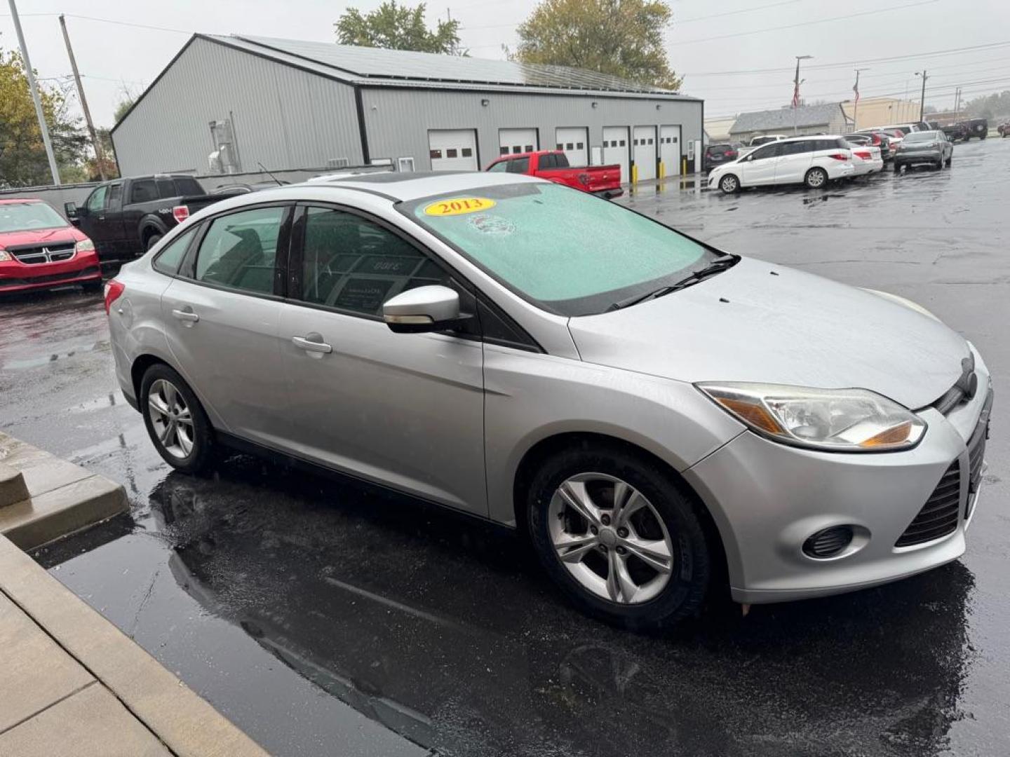 2013 SILVER FORD FOCUS SE (1FADP3F25DL) with an 2.0L engine, Automatic transmission, located at 3100 Covert Avenue, Evansville, IN, 47714, (812) 473-4492, 37.955418, -87.512238 - Photo#2