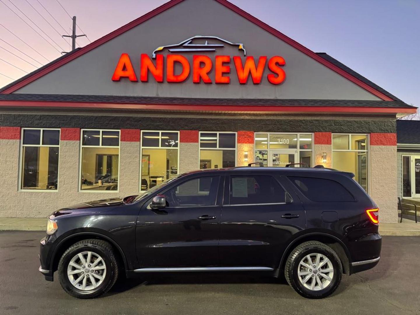 2015 BLACK DODGE DURANGO SXT (1C4RDJAG4FC) with an 3.6L engine, Automatic transmission, located at 3100 Covert Avenue, Evansville, IN, 47714, (812) 473-4492, 37.955418, -87.512238 - Photo#0
