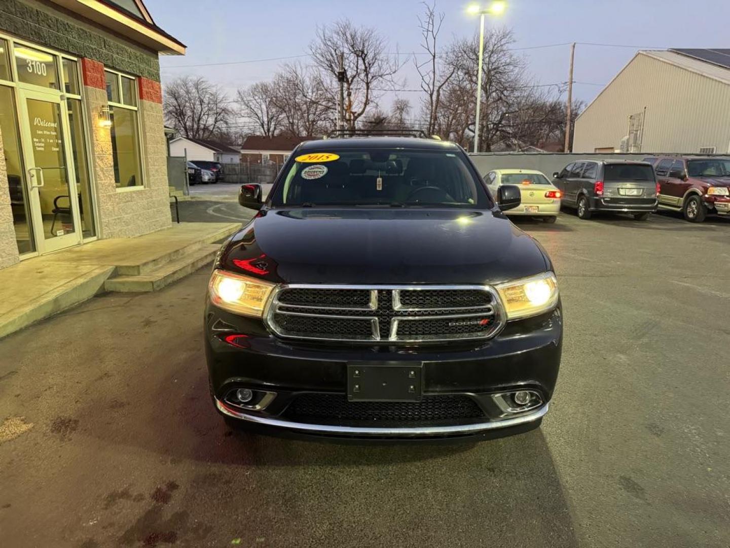 2015 BLACK DODGE DURANGO SXT (1C4RDJAG4FC) with an 3.6L engine, Automatic transmission, located at 3100 Covert Avenue, Evansville, IN, 47714, (812) 473-4492, 37.955418, -87.512238 - Photo#1