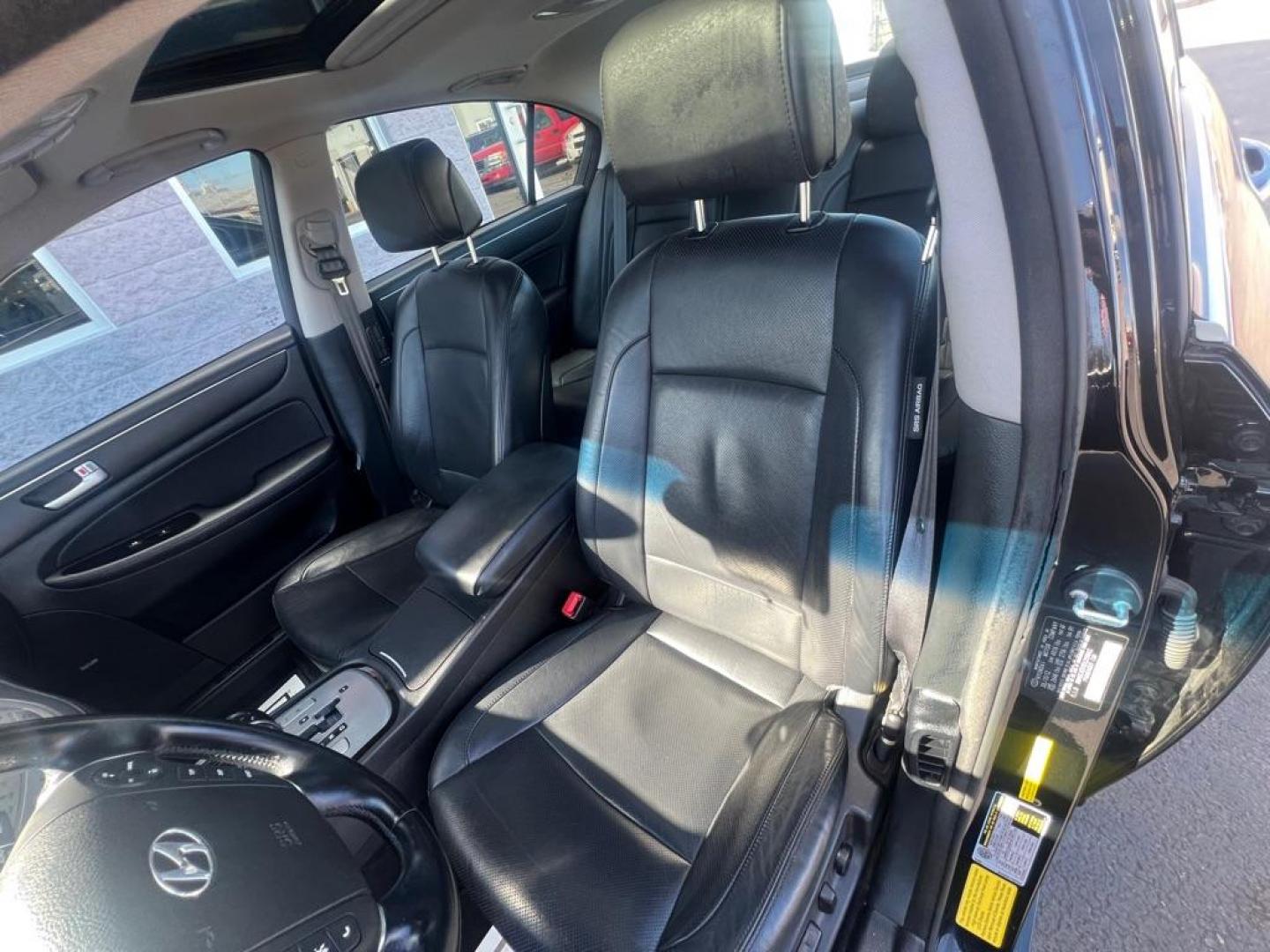 2013 BLACK HYUNDAI GENESIS 3.8L (KMHGC4DD0DU) with an 3.8L engine, Automatic transmission, located at 3100 Covert Avenue, Evansville, IN, 47714, (812) 473-4492, 37.955418, -87.512238 - Photo#5
