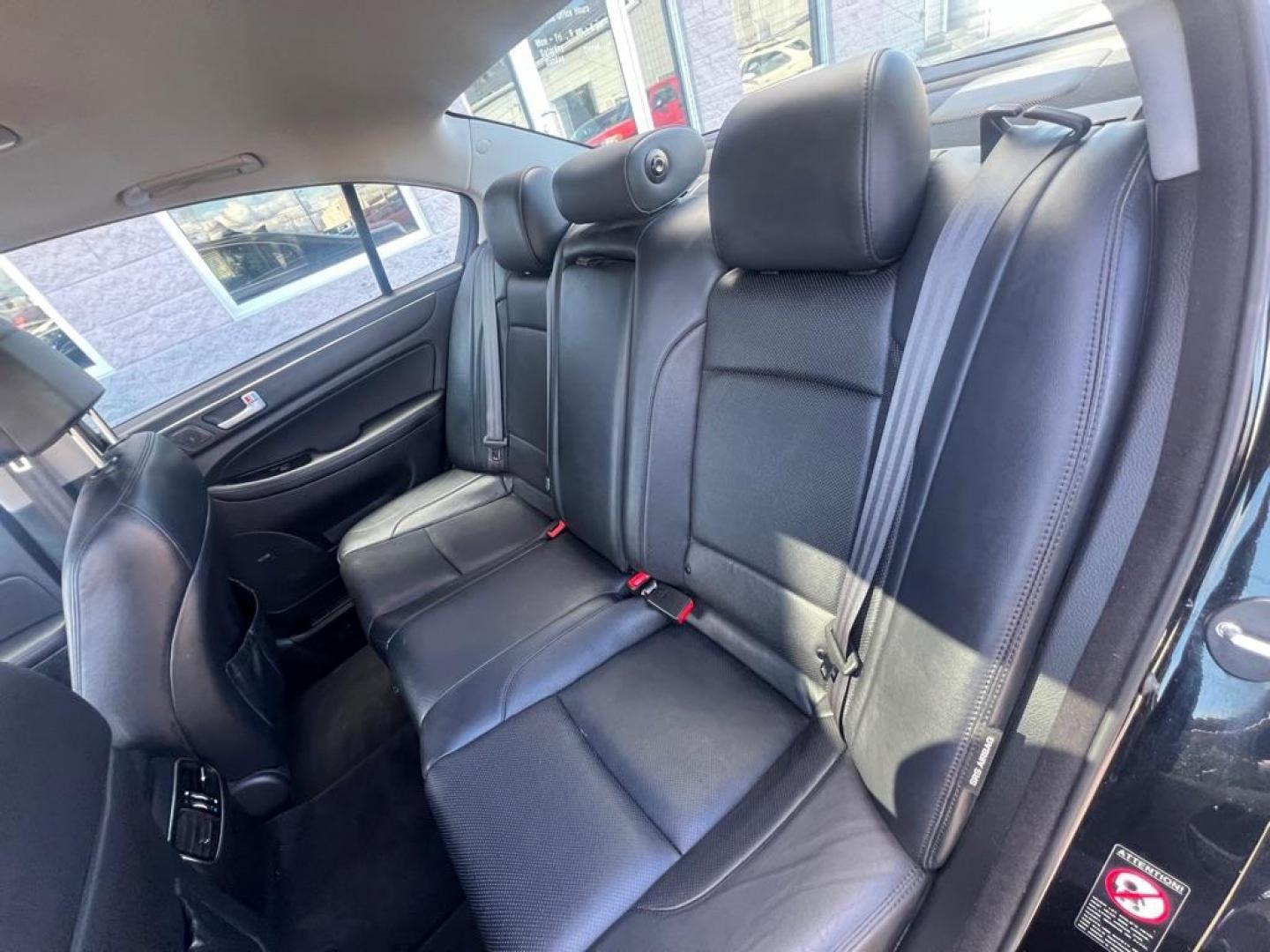 2013 BLACK HYUNDAI GENESIS 3.8L (KMHGC4DD0DU) with an 3.8L engine, Automatic transmission, located at 3100 Covert Avenue, Evansville, IN, 47714, (812) 473-4492, 37.955418, -87.512238 - Photo#6