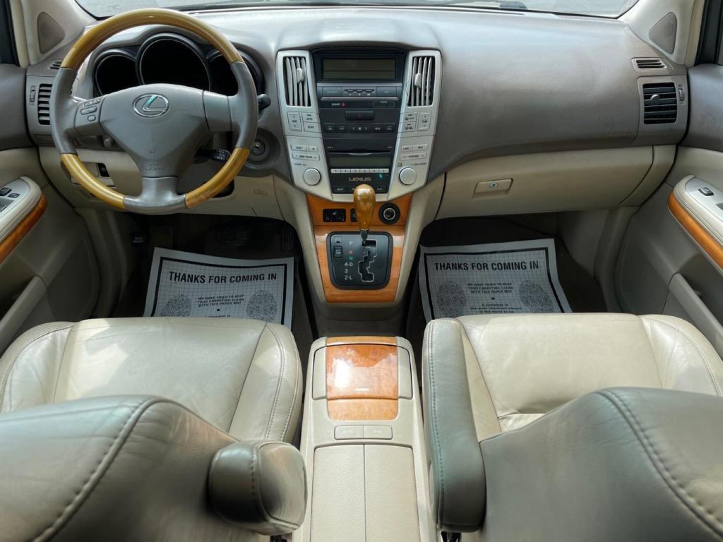 2007 TAN LEXUS RX 350 (2T2HK31U57C) with an 3.5L engine, Automatic transmission, located at 3100 Covert Avenue, Evansville, IN, 47714, (812) 473-4492, 37.955418, -87.512238 - Photo#6