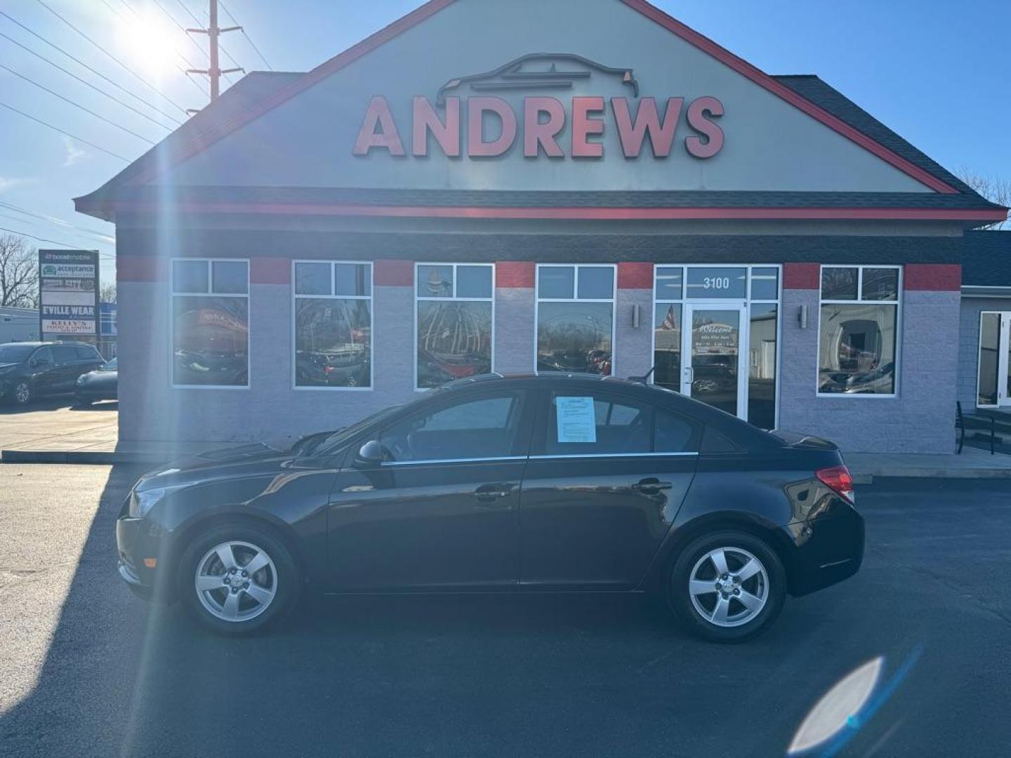 2014 BLACK CHEVROLET CRUZE LT (1G1PC5SBXE7) with an 1.4L engine, Automatic transmission, located at 3100 Covert Avenue, Evansville, IN, 47714, (812) 473-4492, 37.955418, -87.512238 - Photo#0