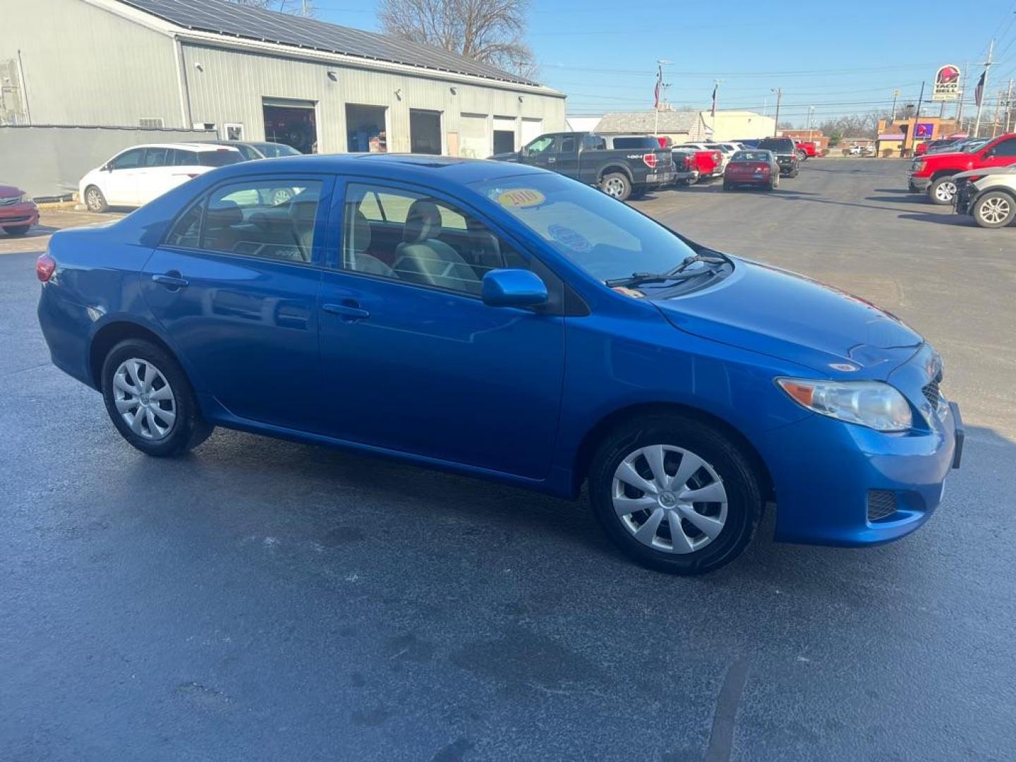 2010 BLUE TOYOTA COROLLA BASE (1NXBU4EE1AZ) with an 1.8L engine, Automatic transmission, located at 3100 Covert Avenue, Evansville, IN, 47714, (812) 473-4492, 37.955418, -87.512238 - Photo#2