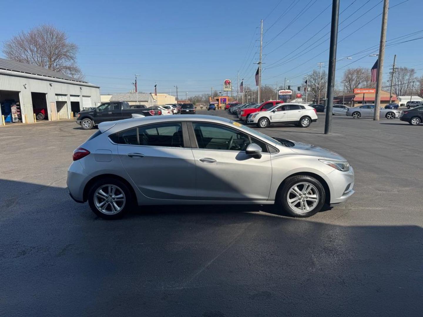 2017 SILVER CHEVROLET CRUZE LT (3G1BE6SM5HS) with an 1.4L engine, Automatic transmission, located at 3100 Covert Avenue, Evansville, IN, 47714, (812) 473-4492, 37.955418, -87.512238 - Photo#2